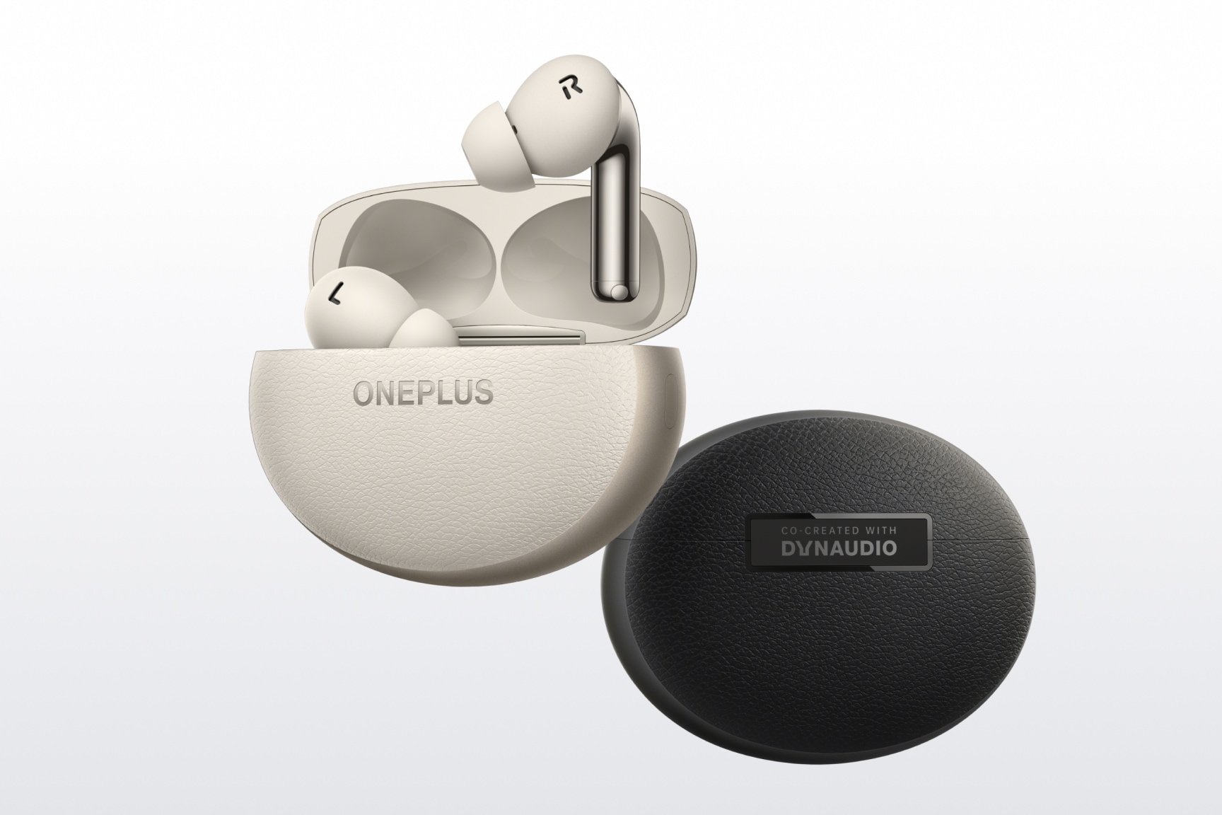 Cream-colored and round wireless Oneplus earbuds with Dynaudio charging case.